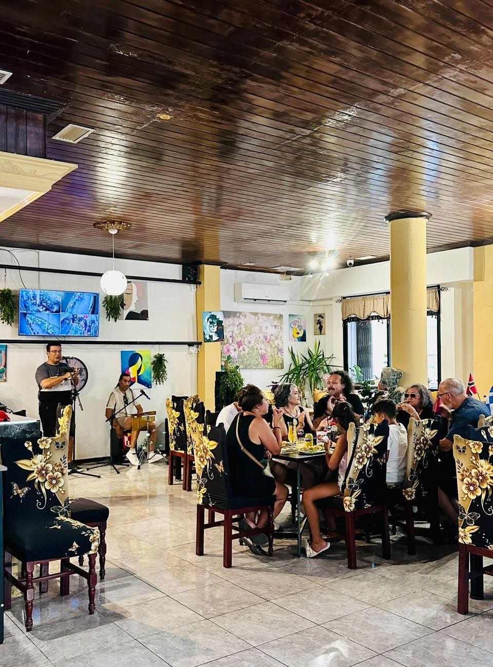 The band playing in the dining room